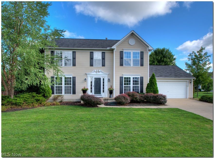 Meticulously maintained traditional colonial!  Comfortable layout!  Nice entry is flanked by living room and dining room!  Large eat-in kitchen includes all appliances and offers sliding doors to nice deck/patio and extends to spacious family room offering nice floor to ceiling windows and oak and brick wood-burning fireplace!  The master bedroom has vaulted ceilings, large walk-in closet and master bath!  Enjoy the extra living space in the finished basement with utility area, storage & playroom!  Lush landscape!  Community pool!  Nice paved walking trail to Memorial Park!