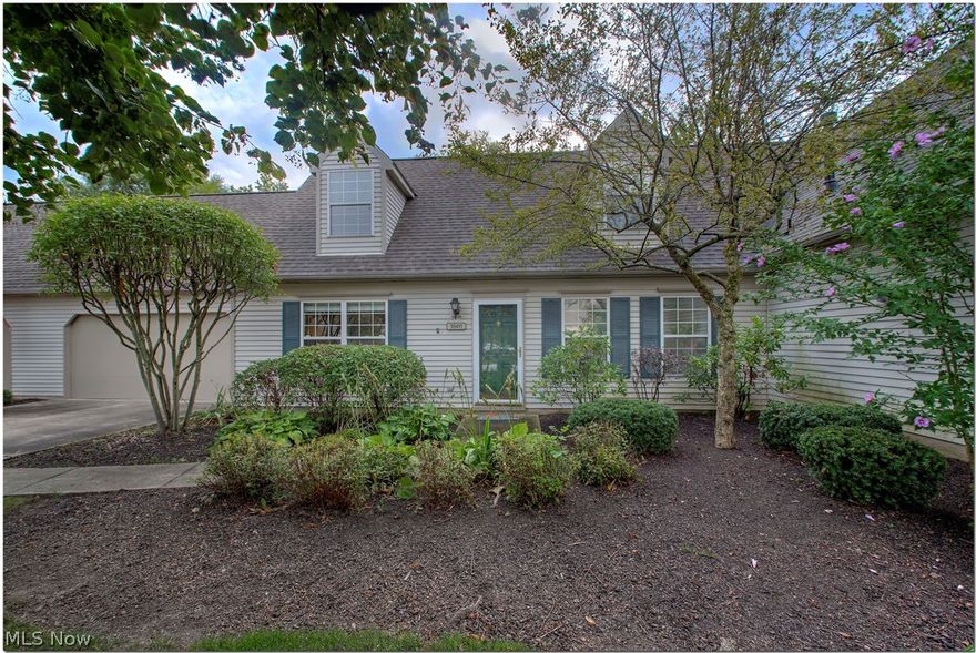 Welcome home to this AMAZING Ethan’s Green Condo! Pride of ownership exudes from every inch of this home that boasts a flexible floor plan. Enter to the large family room with beautiful floors, recessed lighting and modern paint colors that flow to the open dining room.  Prepare and enjoy meals in the eat-in kitchen which was majorly overhauled in 2017.  Slate appliances, granite countertops, awesome rustic wood-look tile backsplash, breakfast bar and Kraftmaid Cabinets round out this beautiful kitchen.  Your days will be brighter as the sun shines through the skylights in the dining area and sunroom that provides additional living space and access to the private backyard patio.  Looking for single floor living?  A large bedroom with walk-in closet,  full bathroom, and utility room attached to the heated 2-car garage complete the first floor.  Bring your imagination upstairs as the unique layout of the second floor can suit a variety of uses.  As you reach the top of the stairs, a seco