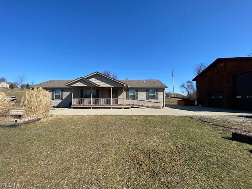 Have you ever dreamed of owning a 1400 sq ft garage with a loft or your own pond? This 5.5-acre property features a one-story home with 3 bedrooms, office space, 2 full baths, and a large kitchen suited for any chef. Wake up in the morning watching the ducks whistle from the 2 ponds. The garage with wood burner offers an amazing opportunity for many of your projects. Need a rest for the day? Follow the steps up in the garage and put your feet up in the spacious loft. The oversized garage door offers plenty of options for many vehicles. You will be surprised by the many features it offers! This is an amazing opportunity to own a picture-perfect property close to St. Clairsville. With breathtaking views, ponds that are ready to be stocked, a huge barn garage, a 1700 sq ft home, you do not want to miss this opportunity!! Call today and schedule your private tour!