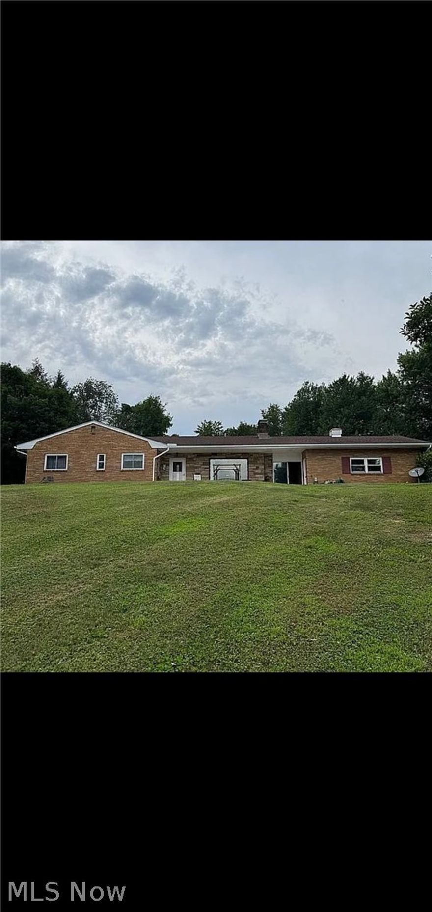 Motivated Sellers!!!!! Beautiful 2,500 sq foot brick home.  This well maintained home offers 3 bedrooms , 2 1/2  bathrooms with a spacious living room\dining room combo. Walk down the unique spiral staircase to the finished basement featuring a large open rec room with a wet bar, pool table, spacious bathroom, and bonus room used as a 4th bedroom. Perfect for extended family, guests or just additional living space. Step outside to a quiet 2 acre lot with a stunning oversized yard, a nice garage, and a gorgeous man-made pond that creates a peaceful backyard retreat. With plenty of indoor and outdoor space to enjoy, this home makes it easy for entertaining and combines comfort, functionality, and charm all into one! Be ready to host family holidays because this is a home your family/friends are going to want to be at!