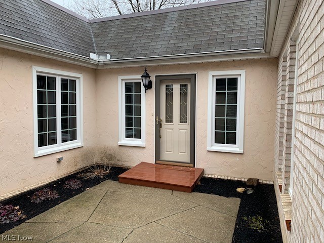 First floor living at its best! Open concept floor plan - fireplace in the living room, sliding glass doors out to the patio. Eat-in kitchen, appliances remain. Master suite and additional bedroom and full bath!