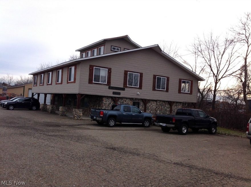 Tons of potential awaits on this multi-use industrial complex. 12 buildings in all, consisting of office buildings, storage buildings, horse stalls, drive through indoor storage buildings, garages and cottages with multi use capabilities. The site features over 21,000 sq ft in all with chain link security fence and private gated entrance. Great opportunity for investor or owner operator/investor to occupy a building and rent out the remainder buildings. Tenant occupied. So many possibilities on this property. You have to see it for yourself.