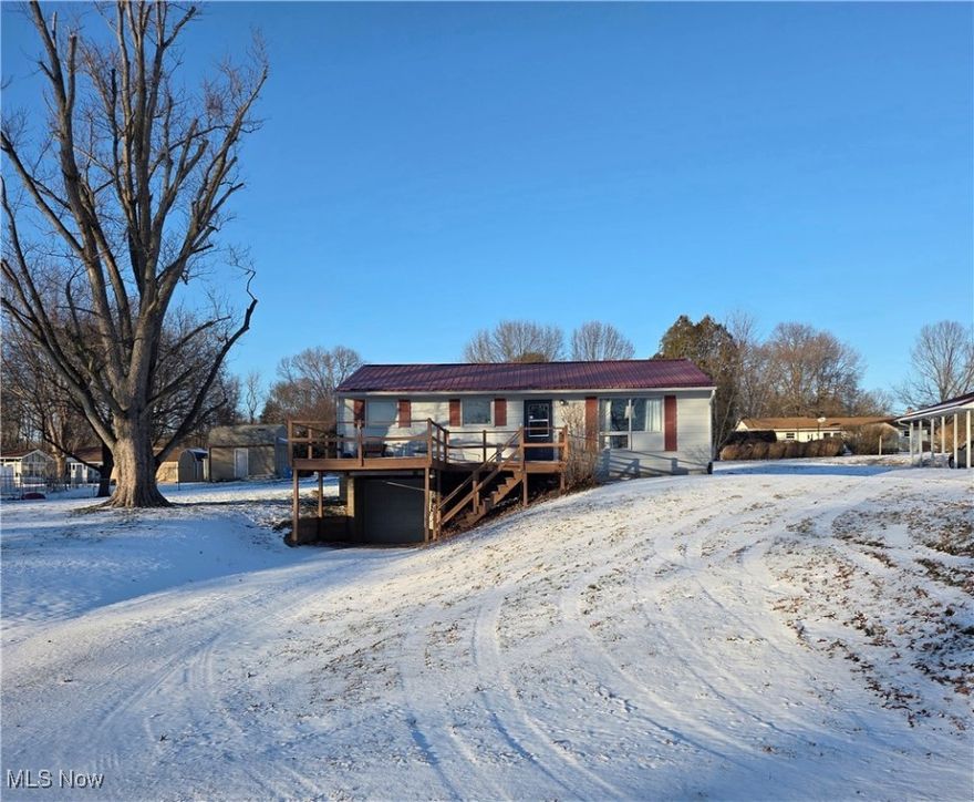 What a great opportunity to enjoy making this lovely ranch home your own! The prime location is well worth the renovations this home needs. On just under half an acre near the end of a quiet street, it is also near the entrance to the gorgeous Southside Community Park with sports fields, walking trails, a dog park, and much more! The view from the front deck of this home is of a beautiful, fenced pasture. On just under 1/2 an acre, the large yard offers plenty of space for play and expansion. The main level Living Area is spacious with its open Living Room, Dining Area, and Kitchen that could be a blank canvas for your personal touch. Down the hall you'll find a Full Bathroom, and three cozy Bedrooms. The Lower Level of this home offers the opportunity for more living space. There is a large space perfect for a Rec Room, and a Utility Room with Laundry hookups. In addition, you'll find the oversized one car Garage for parking out of the elements, and extra space for storage. Existing updates include: Newer metal roof; newer septic baffle. Priced to allow for modern updates, this home could be your opportunity for an investment in the future. Live Abundantly in this ideal location for your dream home!