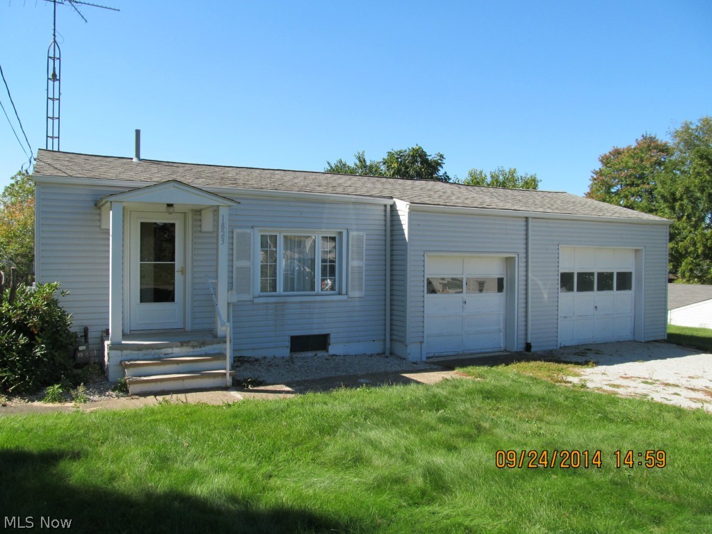 Great little house in move in condition. Perfect condo alternative. Lots of updates. Windows, roof, furnace, siding, water heater and electrical all updated approximately 10 years ago. Carpet and interior paint updated approximately 1 year ago. The brick exterior has been covered in vinyl siding. Originally a 1 bedroom house, but one garage has been converted to living space. Currently it's being used as a laundry but that could be moved into the basement so you could have a 2nd bedroom. The oversized attached garage provides space for a vehicle plus extra storage. Covered patio and large lot with plenty of room for a garden. Come take a look!