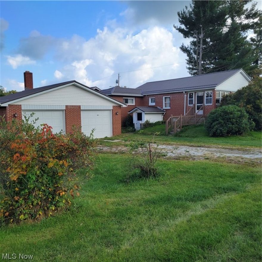 Nice two bedroom brick home with two stall detached garage on a nice lot in quiet Leesville, Ohio. New roof 2023.