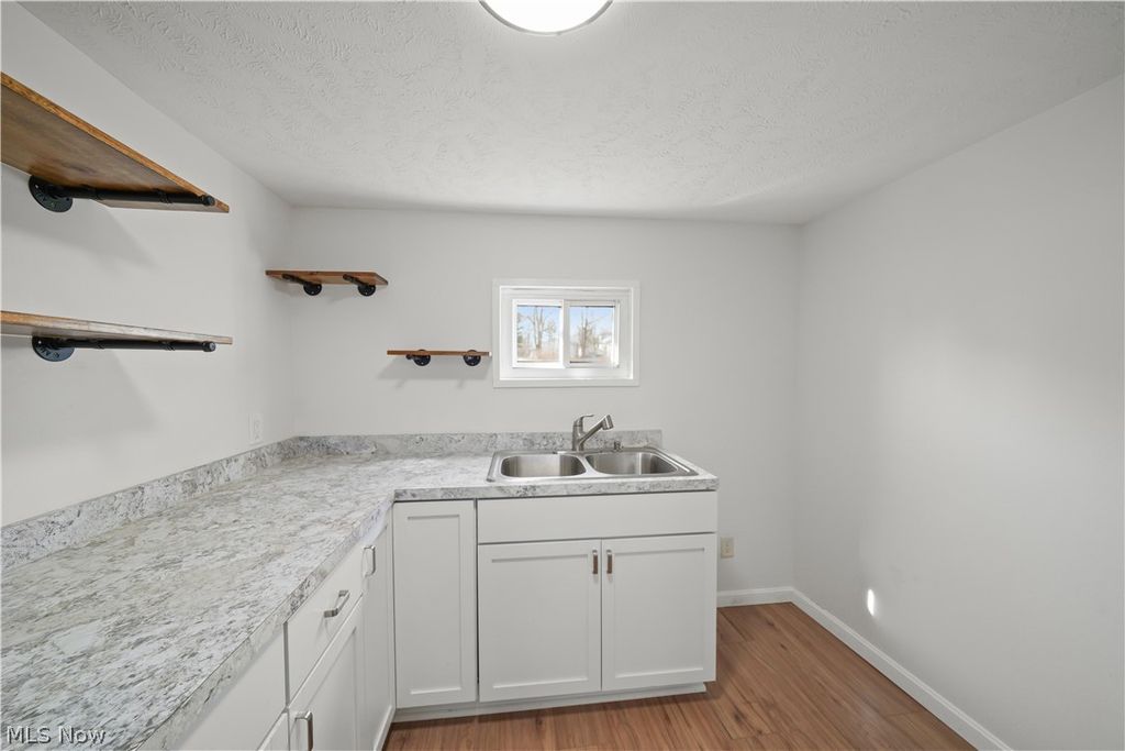 Photo of 2323 Mingo Trail, Akron, OH 44312 (MLS # 5189344)