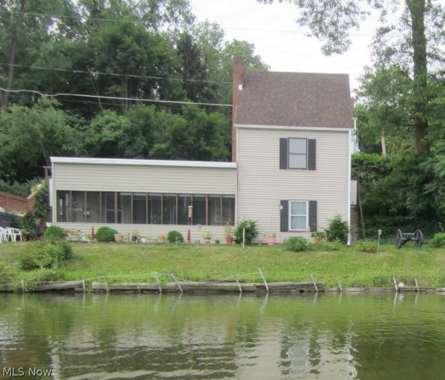 Partially furnished lakefront home on North Reservoir in Portage Lakes. Great for weekend getaway or summer home. Plenty of unique features in this quaint home. Ranch home, but must use steps down to main entrances. Enjoy lake views from every room. Plenty of land to lakeshore, very private and relaxing.