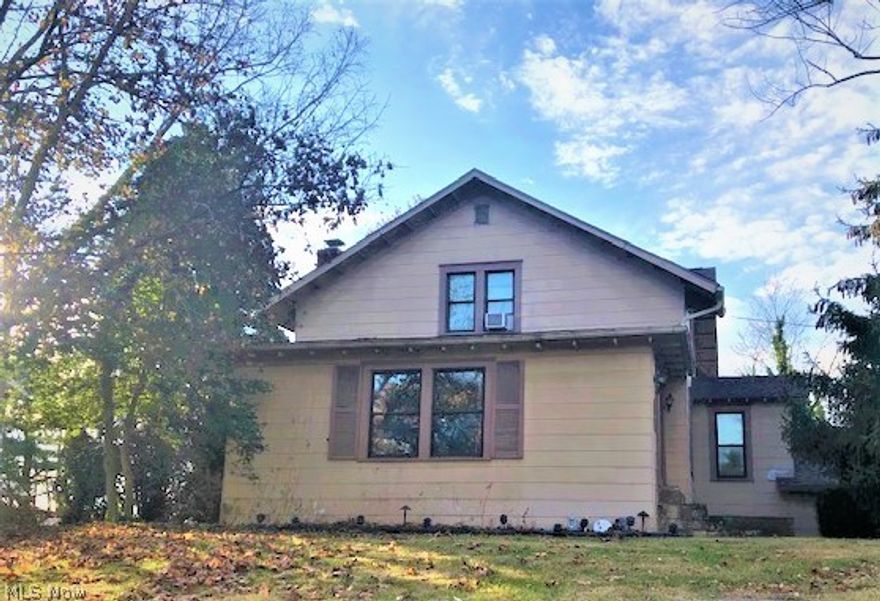 Located close to doctor offices, hospital, schools, and easy access lovely downtown Cambridge and the interstate make this beautiful home a must-see option. Relish the great outdoors on the large back deck perfect for cooking out or with friends. Covered breezeway takes you from the house to the 2-car garage while the other 2-car garage has room for your boat, extra cars, motorcycles or toys. Original woodwork throughout and the home has so much potential with a little updating this grand home will once again be the envy of the neighborhood. The lovely kitchen includes a breakfast nook that overlooks the deck and back yard. The refrigerator, microwave, stove and dishwasher all stay with the home so you don't have to worry about bringing those with you. This home has the square footage so you won’t be crowded. There is a massive 1st floor master bedroom with a walk-in closet and plenty of room for an at home office. Entertaining for the holidays is no longer a question of do we have eno