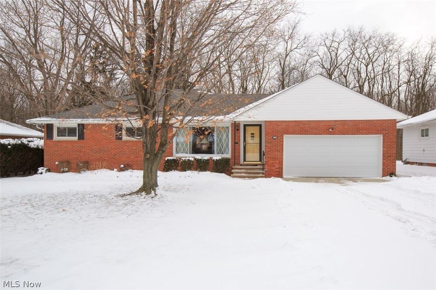 Lovely ranch featuring four bedrooms, inviting living room plus family room with brick fireplace. Updated kitchen cabinets, counters and floor, convenient dining room. Home has been freshly painted. Large finished rec room with loads od storage. Home warranty included. Must see this home. WOW!