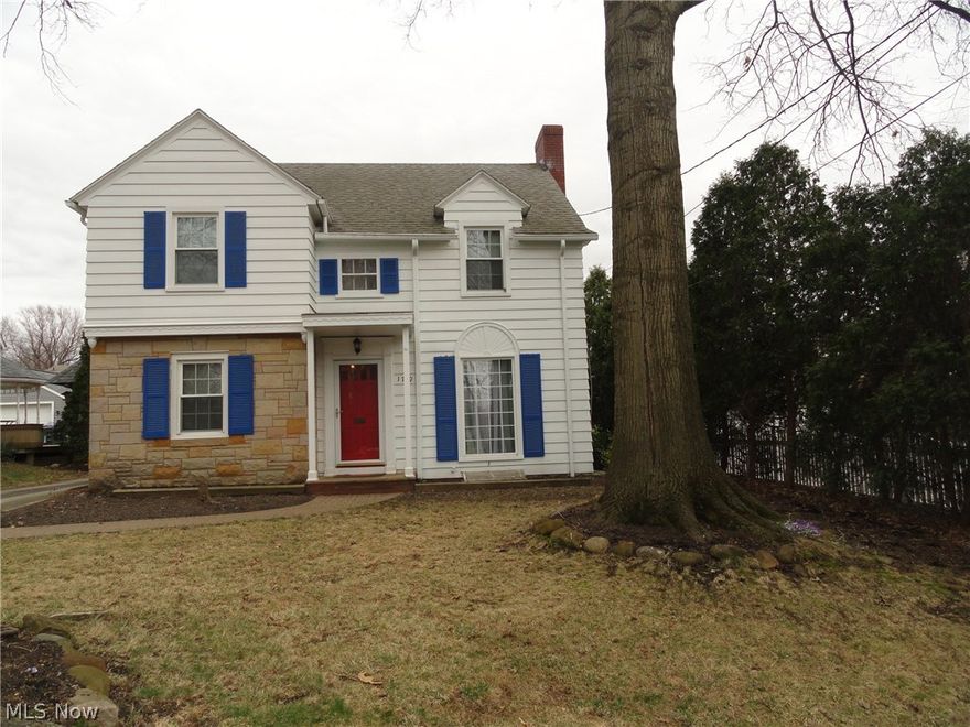 This absolutely charming classic center hall Colonial abounds with character and has rich, warm colors and decor thorughout! It's situated in the desirable and convenient Cuyahoga Falls location between Sackett & Chestnut Blvd!  The foyer entry steps into the huge living room with wood burning fireplace, beautiful moldings, archways and built in bookshelves plus  french doors to the sunny sunroom.   Spacious formal dining room  adjoins the butler's pantry with built in glass cabinets and extends to the cozy kitchen with newer stainless appliances and a wood beamed ceiling.  Beautiful hardwood floors throughout! A full bath completes the first floor.  The open staircase leads to four bedrooms, the master bedroom has double closets. The lower level offers a a large rec room with fireplace and a laundry and storage area. The furnace and windows have been updated. The nice deep backyard  which is mostly fenced,offers a stone patio with fire pit, oversized concrete driveway, 2 car attached