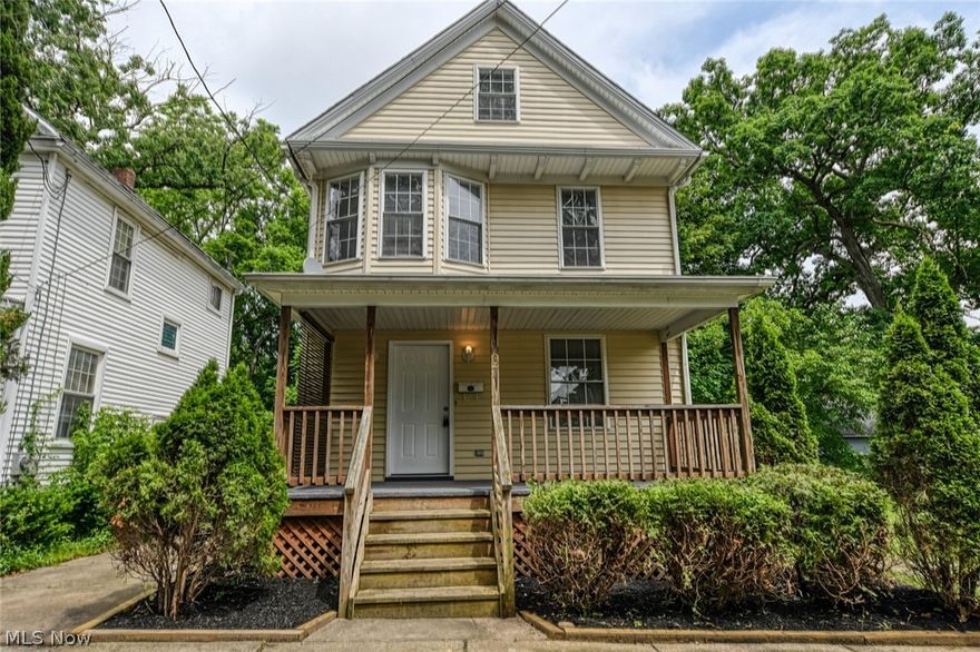 Stunning gem in northwest Akron! 100% updated interior, vinyl siding, replacement windows, huge front porch and nice back deck. The airy front porch has new outdoor carpet. Enter into the living room to find the brand new carpet, that runs throughout the home, as well as a ceiling fan and charming mantel and bench. Into the formal dining room with a lovely light fixture and window seat. The kitchen has fresh vinyl flooring, white washed oak cabinets and updated laminate counter tops. Kitchen comes with a refrigerator and range. It also offers a wonderful breakfast nook, that has sliders leading out to the back deck. On the second level you will find an impressive master bedroom! This large room has a bay window, two large closets and a spare with tv hook up. There is also another bedroom and a wonder bathroom. The last bedroom is located on and takes up the entire third floor! There's still more on the lower level. The entire basement is finished, offering a large rec room, full bath,