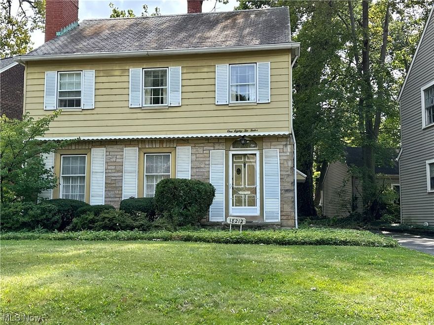 Welcome to 18212 Sherrington. This classic 4 bedroom 1.5 bath Shaker Heights colonial boasts old world craftsmanship, charm and abundant storage. The first floor has a large living room, with a fireplace and original built-ins. Flows into a formal dining room with a screened in porch off the back. The adjoining eat-in kitchen has a large breakfast nook and a pantry. Down the stairs off of the kitchen you'll find a half bath for guests on the way to the rec room in the basement which has its own fireplace. Upstairs on the second floor there are three large bedrooms (all with hardwood floors under the carpet) and a full bathroom with an attached vanity room. The third floor has yet another large bedroom with built-ins and additional storage room. Outside you'll find a secluded backyard off of the screened porch, a two car detached garage and a generator for peace of mind when Cleveland's weather takes a bad turn. The house is perfect for a growing family or investor with the vision to ma