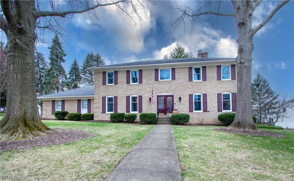 Wow! check out this Fantastic brick two-story home located on a corner lot in Plain Local Schools—an established neighborhood w mature trees. The first floor has a great floor plan w a two-story foyer and slate floors. The great room has an abundance of natural light is to the right of the foyer & to the left is a 1/2 bath and the formal dining room. You will love the gorgeous updated kitchen w (a massive center island/farmhouse sink/quartz counters/coffee bar/white cabinets/charming lighting fixtures/subway tile backsplash/stainless appliances) and a window seat w drawers. Enjoy family time in the open concept kitchen to the family room adorned w a beautiful Limewash wood-burning fireplace & access to a large patio. Four large bedrooms (one w a study room 6x5) and another full bath are on the upper level. The Master bedroom has a pampering private bath w double sinks, a huge walk-in shower w a beautiful tile surround & two showerheads. Convenient first-floor laundry & attached two-car