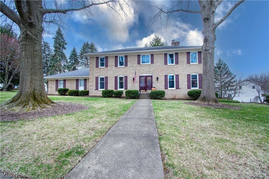 Wow! check out this Fantastic brick two-story home located on a corner lot in Plain Local Schools—an established neighborhood w mature trees. The first floor has a great floor plan w a two-story foyer and slate floors. The great room has an abundance of natural light is to the right of the foyer & to the left is a 1/2 bath and the formal dining room. You will love the gorgeous updated kitchen w (a massive center island/farmhouse sink/quartz counters/coffee bar/white cabinets/charming lighting fixtures/subway tile backsplash/stainless appliances) and a window seat w drawers. Enjoy family time in the open concept kitchen to the family room adorned w a beautiful Limewash wood-burning fireplace & access to a large patio. Four large bedrooms (one w a study room 6x5) and another full bath are on the upper level. The Master bedroom has a pampering private bath w double sinks, a huge walk-in shower w a beautiful tile surround & two showerheads. Convenient first-floor laundry & attached two-car