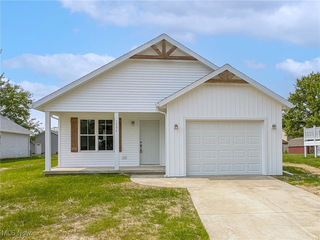 $10,000 PRICE IMPROVEMENT! This stunning NEW CONSTRUCTION offers a unique blend of modern design and convenience. With a 10-year 75% tax abatement, this home is a fantastic investment. The one-story layout features an open floor plan, a cozy fireplace in the great room, and a beautifully designed kitchen with granite countertops, stainless dishwasher and range, and a sleek wall-mounted range hood. The primary suite is a true retreat, complete with a private full bath, double sinks, a large walk-in closet, and direct access to a covered back patio - the perfect spot to enjoy your morning coffee or unwind with a glass of wine. Additional highlights include an attached garage with a heated utility room and a welcoming covered front porch. Located just minutes from Cedar Point, Sports Force, and the beautiful shores of Lake Erie. Don't miss the opportunity to make this beautiful home yours! No HOA.
