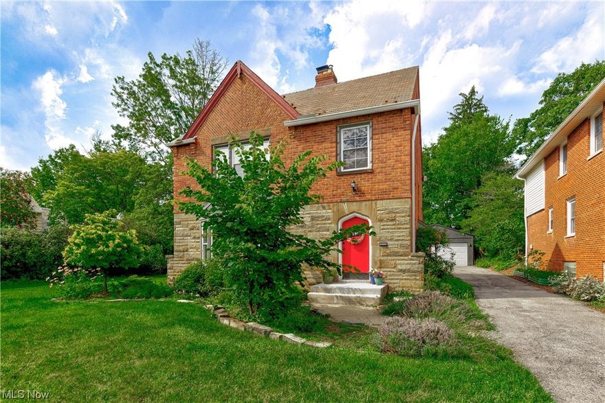 Welcome home to this charming Colonial located on a lot & a half in University Heights.
