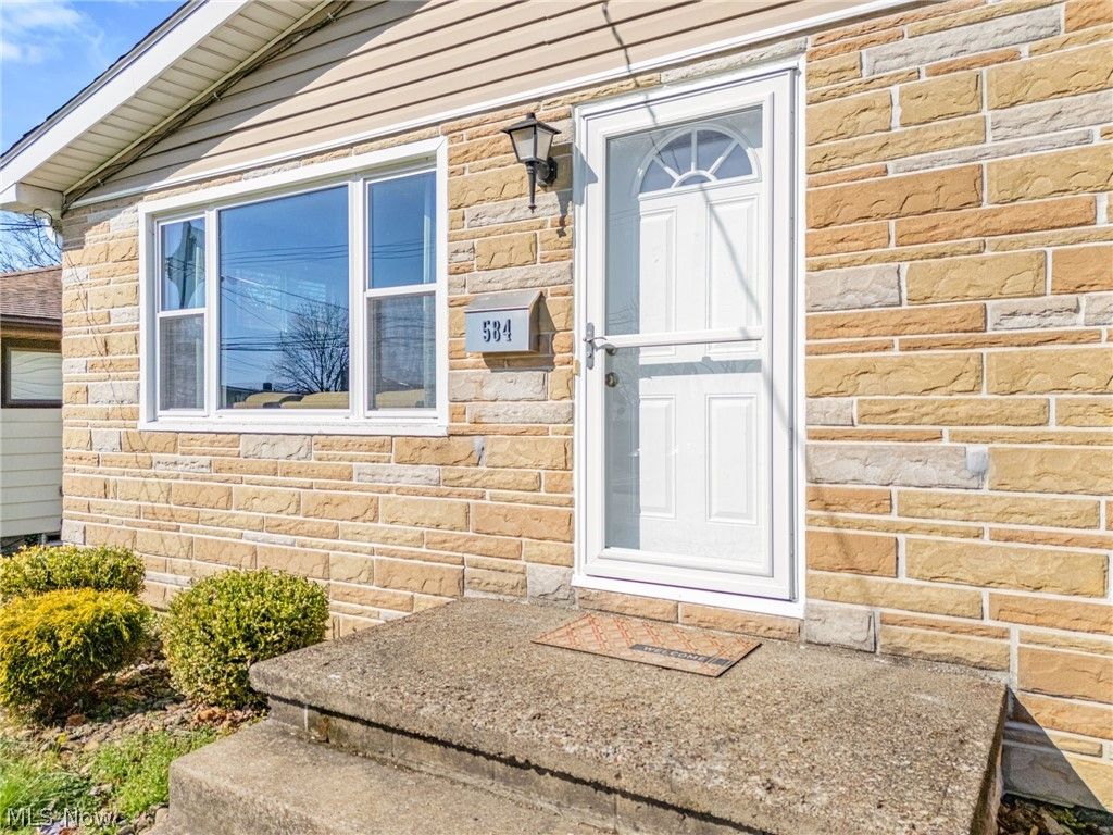 Photo of 584 Hilbish Avenue, Akron, OH 44312 (MLS # 5194396)