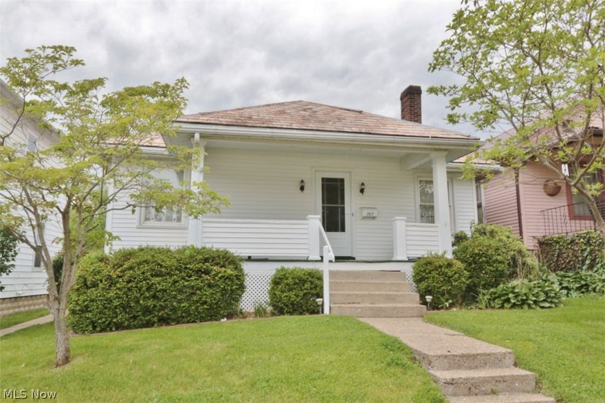 Cozy, much loved home that has been well cared for over the years.  Kitchen with lots of cabinets and built in island.  Updated Bath, replacement windows,  plenty of closet space.  Nice sized living room open to dining (or could be one large living room) Full basement with workshop.