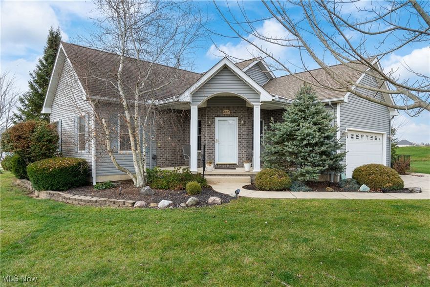 Welcome to 607 Rundle St, an architectural designed and custom 2000+Sq Ft Home by Steiner Builders overlooking the scenic Grey Hawk Golf Course.  As you enter the home the large foyer with oak flooring flows into the living room with access to the garage.  The large master bedroom has double closets with master bath.  The 9 ft ceilings along with the open floor plan and lots of windows provides a remarkable feeling throughout the home. The large open living room has a fantastic fireplace, filled with natural light overlooking the 12th hole of the golf course.  The beautiful kitchen features solid maple cabinetry, quality appliances, Oak flooring, Corian counter tops and lots of natural light. The dining area adjacent to the kitchen has a sliding door with direct access to the patio. The scenic back patio is a great place to relax after a long day and enjoy the views.  The wide-open entrance to the lower level has beautiful solid wood railing with solid oak steps.  The lower level has a large family room, bedroom and 1/2 bath that makes this area ideal for that much needed private space. The lower bedroom has 2 large egress windows that provide lots of natural light and is great for family or friends.  The family room entrance has double wood doors to close if needed. The lower-level Mechanical room is very large and would also make a great workshop, mancave or 4th bedroom. The yard is very tastefully landscaped with mature trees. The house features engineered concrete lower insulated cement walls, custom woodwork throughout, solid wood doors, Anderson windows, 1 yr old Carrier 90% furnace w/air conditioning, 1 yr old Rheem Hot water tank, battery backup sump pump. and fenced in dog area. This home has it all and is a must-see property located in a very peaceful neighborhood in Grey Hawk Golf Community