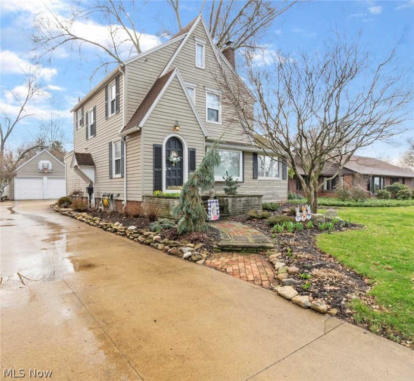 Welcome to this one of a kind home that’s been impeccably updated from professional landscaping on the exterior to the custom Bolon kitchen this is a must see! Located in the desirable neighborhood of Charity Rotch charm & character fills the home. As you enter through the front door you’re welcomed with original hardwood floors flowing through the living room, dining room & family room that is a great flex space and is currently used as a play room! The spacious living room features a beautiful wood burning fireplace that is surrounded with gorgeous built-ins. Natural light flows throughout the dining room and into the custom Bolon kitchen that is out of this world! Granite countertops, updated appliances, hardwood floors, built-in breakfast nook, pantry & so much more! The second floor features three spacious bedrooms with new carpet in the guest rooms, fully updated guest bath from the tub, tile surround & vanity. As you move to the finished lower level with laminate flooring there