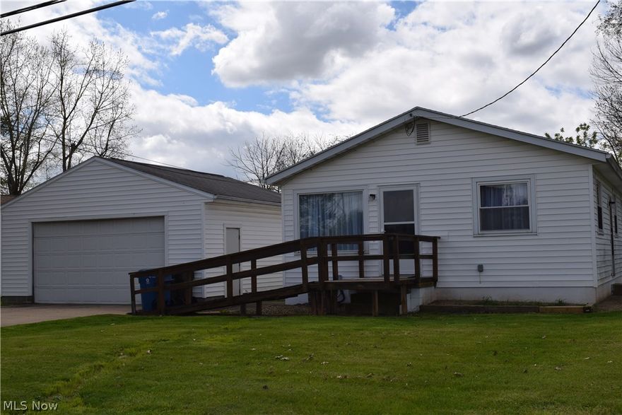 3 Bedroom ranch with handicap ramp. 2 Car detached garage. Freshly painted inside and basement. Interior doors- stained. Installed 2 new windows, 1 in kitchen and 1 in bedroom. New kitchen and bath- 2017. Dead-end street. New carpet throughout- 2017. Vinyl replacement windows approx. 10 years. New screen door.