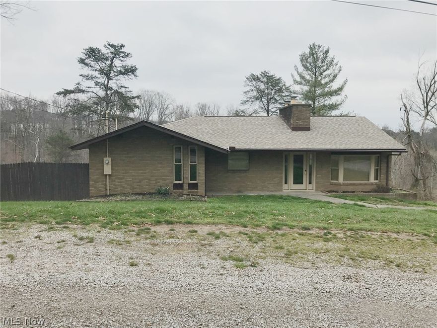 This four bedroom, three full bath brick home offers a very private setting.  In-ground pool with nice deck situated on almost two acres.  Priced to sell!  Blennerhassett Elementary and Middle School/PSH