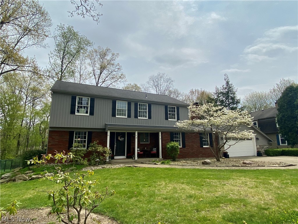 Located on a half-acre lot in one of Niles's most coveted neighborhoods, this custom built traditional has everything you've been looking for. Offering a floorplan equally ideal for day-to-day living and hosting large get-togethers, this home has space to spare but feels warm and welcoming at the same time. First floor highlights include a large living room with brick fireplace, formal dining room, stunning eat-in kitchen with incredible cupboard and counter space, casual dining area, laundry room, and half bath. The second story features a master bedroom with remodeled bathroom, three guest bedrooms, and an updated hall bath. The walkout basement offers even more usable space with a rec room, wet bar, media/game room, and half bath. Step into the private backyard to find stone walls, walkways, beautiful landscape, and a sizable yard perfect for an inground pool or sport court. The one car garage with extra storage space would make a great pool house or she shed. Relax and unwind on t
