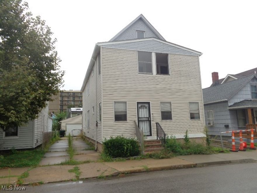 Two Family In Gordon Square!! Two Car Plus Garage(528 Sq Ft) Built In 2006!! Nice Rear Porch!! Three Bedrooms Each Suite!! Separate Utilities!! House Needs Some Updating/Remodeling But Priced To Sell!! Great Rental Area!! Home Being Sold AS IS!!