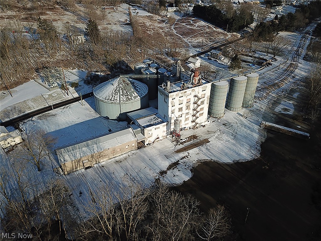 Former Flour Mill On 3.3 Acres - On-site Auction With Online Bidding Available - ABSOLUTE AUCTION, all sells to the highest bidder on location. ONLINE BIDDING BEGINS FRIDAY – MARCH 11, 2022 – 12:00 PM and AUCTION LIVE ON-SITE BIDDING WILL BEGIN TUESDAY – MARCH 15, 2022 – 12:30 PM.
Real Estate: Former flour mill sits on 3.3+/- acres in the NW corner of Loudonville with very easy access for semi-trucks. This site includes a 122’ X 38’ timber frame steel-sided building with a mix of office space and warehouse on ground level. Also, a full-length mezzanine above for added storage. Attached is a six-story concrete constructed building ideal for warehouse or manufacturing with approx. 20,000 sq. ft. floor space. It includes heavy 3-phase electric, cargo elevator, public utilities, 100 ft. semi-truck scale & over 250,000 bushel of grain storage. This property presents a rare opportunity for the right person. Literally, hundreds of tons of salvageable steel to transfer with the real estate in