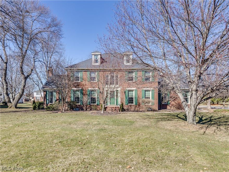 This spacious 4 bedroom, 2.5 bathroom, 2800 sq ft home is situated in North Canton CSD and is everything you’ve been searching for! Located in the desirable neighborhood of St. Ives, you will be pleasantly surprised with the character and charm of this home. As you enter the home, you are welcomed in to the foyer that features hardwood floors and is situated between the living room, that offers a gorgeous gas fireplace with built-in bookshelves, and the elegant dining room. The expansive open concept kitchen showcases a large island, breakfast bar, dinette, ceramic tile flooring, quartz countertops and direct access to the back deck. Adjacent to the kitchen is the family room that offers vaulted beamed ceiling and gorgeous full masonry wood burning fireplace w/gas logs and brick surround. The office highlights the hardwood floors, chair rail and built-in bookshelf. Also situated on the 1st floor is the large laundry room, half bathroom & access to the attached 2 car garage. Large upsta