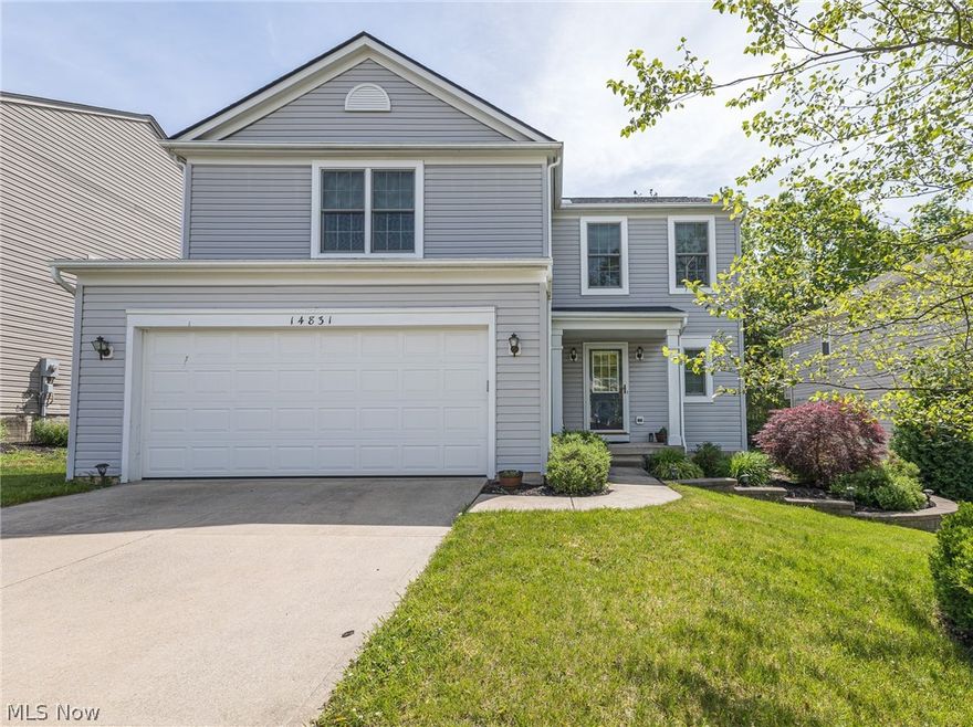 Beautiful & Bright, this welcoming North Royalton Colonial showcases 4 bedrooms, 2.5 baths with a finished basement, lush landscaping & 2 car garage; situated in Fountain Pointe, a quaint cul-de-sac street near the Metroparks & quick interstate access! The covered front entry takes you into the inviting foyer, opening to the spacious family room with cozy gas fireplace. Cook your favorite meals in the eat in kitchen, complete with ample cabinetry, center island with seating, stainless steel appliances, pantry & dining area w/ slider out to the sprawling back patio, perfect for summer BBQ's! The convenient first floor laundry room and 1/2 bath round out the main level. Upstairs you will find 4 bedrooms & 2 full baths, showcasing the owner's suite with walk-in closet and private bathroom! Fun for the whole family, the large finished basement provides a home theater and plenty of recreation space! New roof(2021), Hot Water Tank(2018), Anderson Windows(2018) & Furnace(2017). Welcome Home!