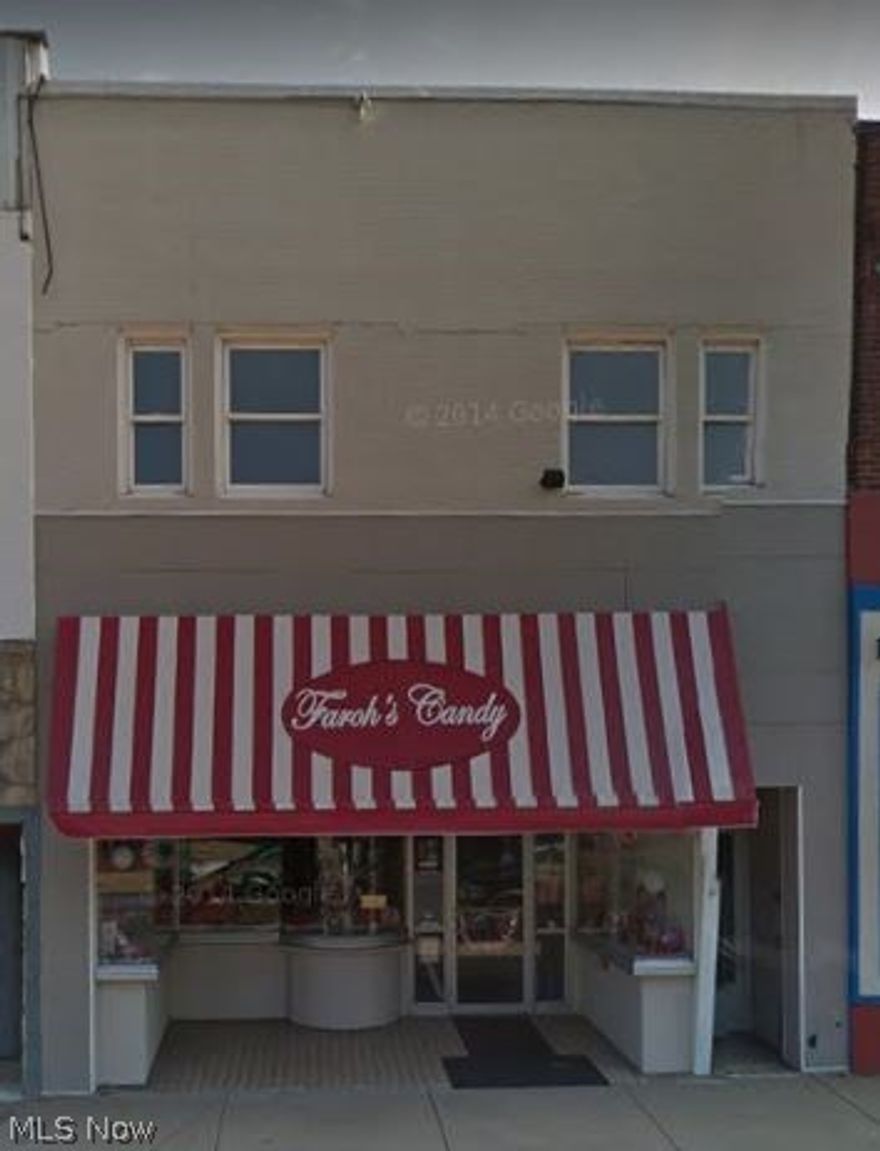 This commercial property located in the heart of downtown Lorain is priced to sell quickly. The downstairs unit, which use to be a retail candy store, has 2,400 square feet of room with two half baths. The upstairs unit has a large studio area with two offices and a bathroom that can be converted into an office space with over 2,000 square feet. The upstairs unit suffered some water damage to the ceiling that is in need of repair. The basement contains 1,600 square feet of room for additional storage space.