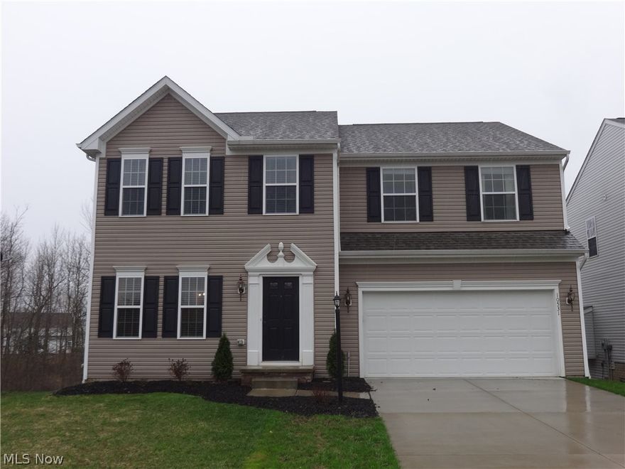 Great setting! Cul-de-sac! Close to the walking paths through the development!  Why build when you can move right in?  Welcoming formal living room and dining room, great kitchen with large island, morning room off kitchen leads to deck, family room has stone gas fireplace, guest half bathroom and a true mudroom on the first floor!  Second floor has a loft , 4 bedrooms, 2 full bathrooms,  (including a master bedroom suite with private master bathroom - you will love the glass enclosed shower, separate tub, double sinks - and two walk-in closets).    Finished walk out basement has great additional living space, a full bathroom and lots of storage.  Freshly painted, some newer carpeting, granite counter tops.  1 year home warranty included.  This home is ready for you to move right in.  Twinsburg schools!