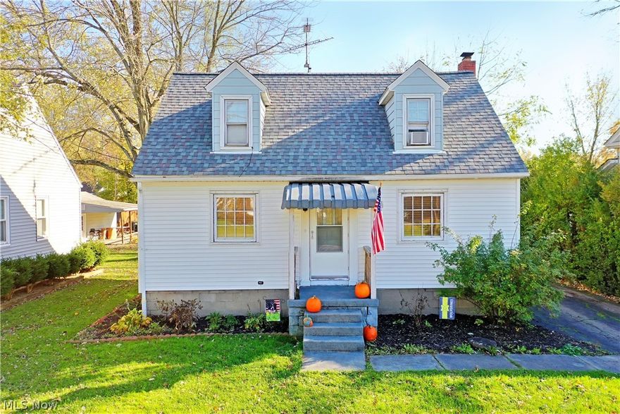 Hurry in to take advantage of this cozy three-bedroom Warren home, offering tastefully updated living space and a finished basement! Tastefully landscaped and waiting under the shade of the nearby trees, the home offers a unique location placed minutes away from local shopping districts and attractions. A covered front patio leads you in to find a spacious living room where dark, hardwood style flooring pairs with sculpted plaster archways, where the central dining room awaits nearby along with the carpeted main stairway. Just around the corner, the updated kitchen delights with its bright white cabinetry and stainless appliances paired with marble look countertops. The ash-colored flooring continues down the main hall where built in cabinets join a lovely first floor full bath. The bath has been recently been updated with new flooring, vanity, and tub/shower surround. A large first floor bedroom sits at halls end with an inviting layout and private closet. Upstairs, additional built-i