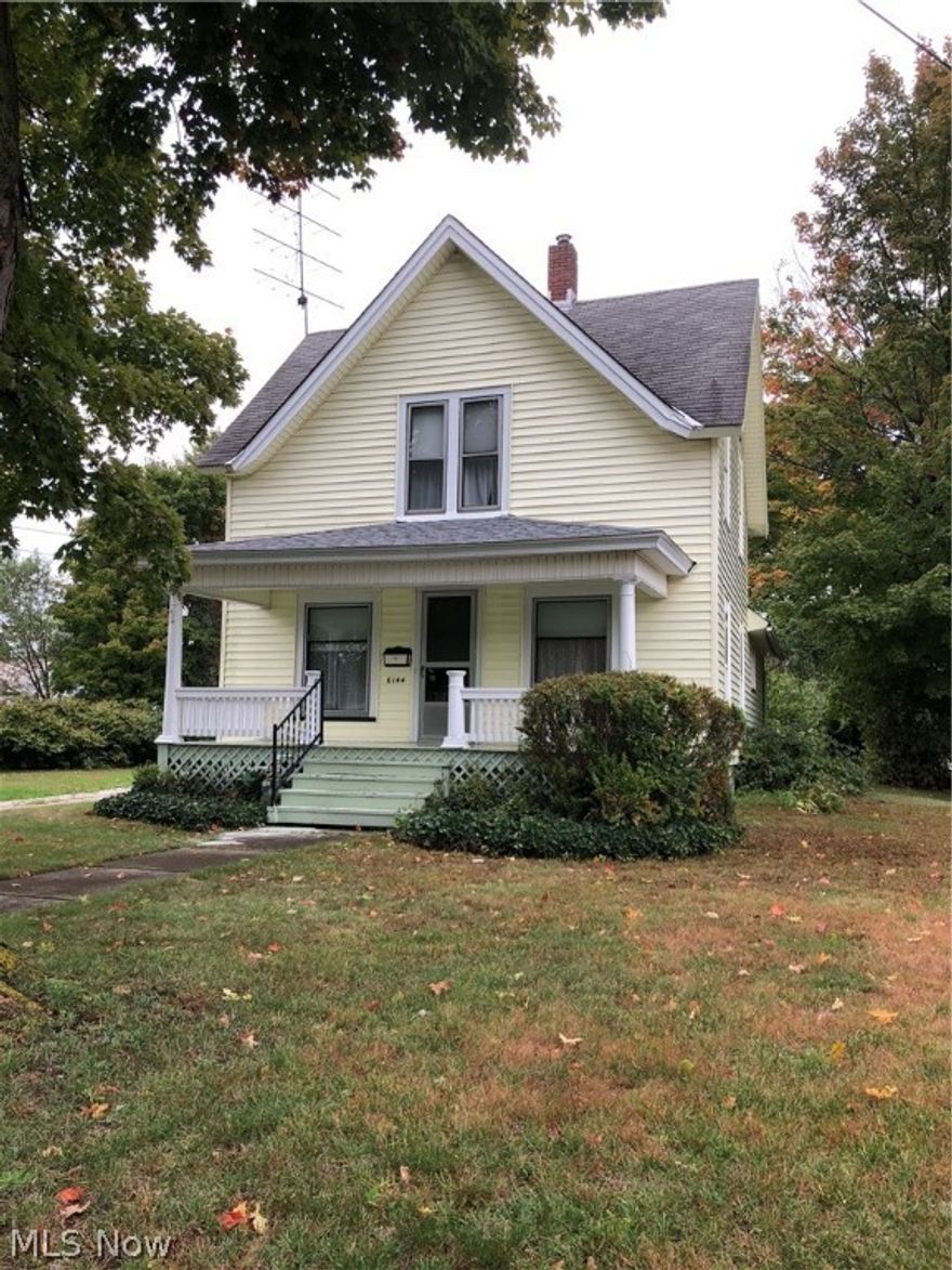 Please check out additional options with this property.  This home features a 3 BR/1.5 bath colonial situated on approx. .21 Acres.  It boasts a large kitchen with plenty of cupboards and a formal dining room for entertaining family and guests.  There is a large living room with newer carpet thru-out.  There is a full bath with a claw tub for an evening of soaking and relaxing.  Enjoy the large front porch as well as an enclosed side porch which is great for those coats and boots.  It also features a large 2 car garage with cement floor.  You can also purchase Parcel # 05-110-00-012-00 which includes another 2 car garage and sits north of this home and corners on Layman for $77,900.  There is also a parcel behind these 2 properties (Parcel # 04-025-00-051-00.  You can buy all 3 parcels for $89,900.  This property is situated close to shopping and schools.  Please check out the map.