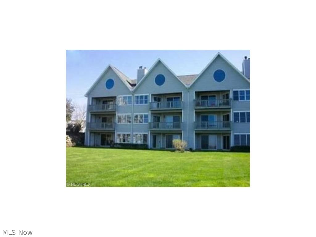 Enjoy lakefront living with a Lake Erie Panoramic View in this beautiful 2-story condo with gorgeous views from walls of windows to Lake Erie!! Open floor plan with a gas burning fireplace to cozy up on those cold winter evenings. The master suite features a spacious master bath with a shower and a separate soaking tub not to mention the generous size walk in closet. A spiral staircase leads to the loft/office that overlooks the living area complete with a beautiful view of the lake. A private deck off the dining room overlooks the lake as well! Great storage throughout the inside and bonus exterior storage room in addition to the one car garage. Maintenance free lake front living.....Call today to schedule your private showing!