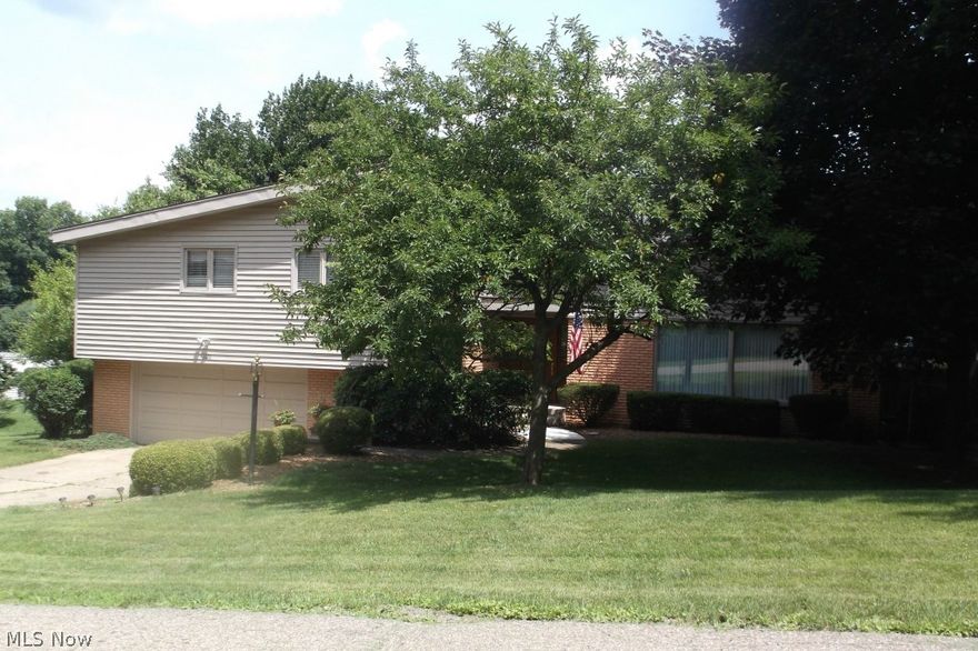 Beautiful home with 2586 square feet, 2 fireplaces,large family room addition, finished, walkout basement,deck and a quality property .