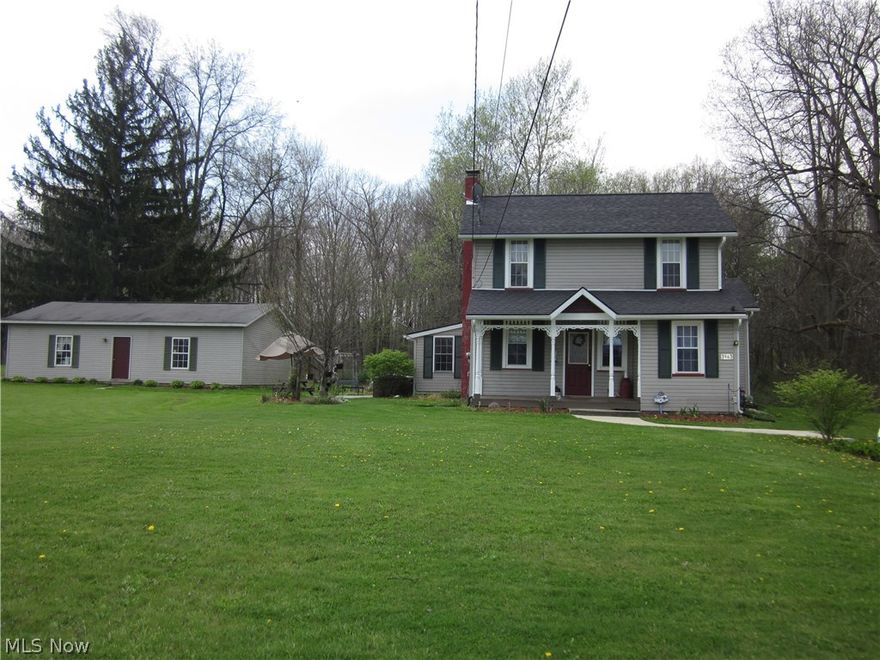 Remodeled Century Home with lots of character. Open exposed beams, hardwood floors, 1st floor laundry, 3 possible 4 Bedrooms, Sun room, 24X40 detached garage with workshop, 5 + acres.