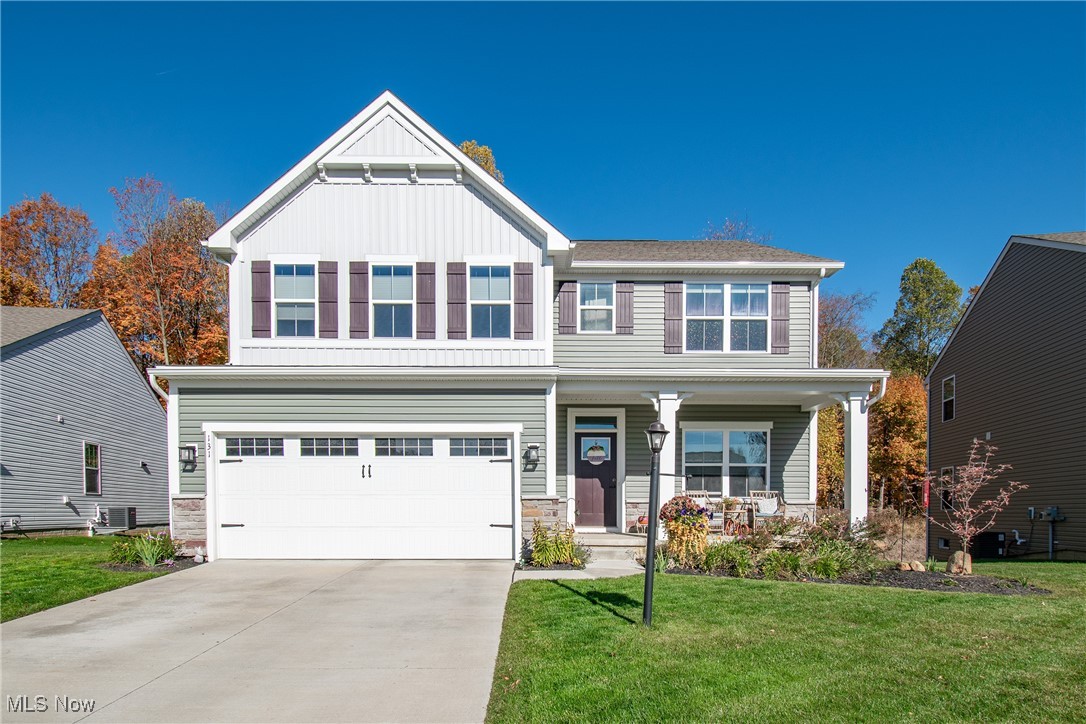 Welcome Home to this beautiful home  Built in 2022, this stunning 5-bedroom, 4-bath home combines modern design with everyday functionality located in the Germaine Reserve development located between Stow and Kent. Step inside to an inviting open-concept layout featuring a spacious living room, dining area, and a beautiful kitchen with an oversized island, perfect for entertaining and family gatherings. The first floor also offers a private home office, a convenient bedroom, and a mudroom for added storage and organization. Upstairs, you'll find a generous loft area ideal for a playroom or media space, two additional spacious bedrooms, a laundry room, and a luxurious primary suite complete with two walk-in closets and a spa-inspired bathroom. The finished basement expands your living space even further with a large recreation area, a fifth bedroom, a full bath, and plenty of storage. Enjoy outdoor living on the newly built deck in 2023 overlooking the fully fenced backyard with a beautiful wrought-iron fence. The professionally landscaped yard also includes a brand-new patio with a gas fireplace added in 2024, perfect for cozy evenings outdoors. This home offers the perfect blend of comfort, space, and style. Schedule your private showing today!