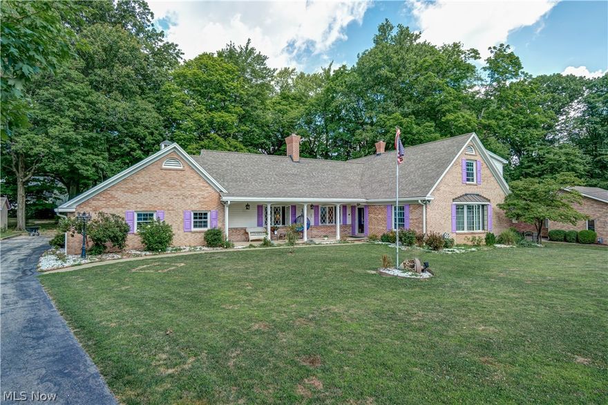 Solid, spacious custom home in prestigious N.E. Location with a tranquil, extensive front porch! Large eat in kitchen with maple cabinetry, white quartz and updated stainless appliances. Large family room with vaulted ceiling, brick gas fireplace with French doors leading to a newer back deck.  First floor laundry/mud room. FIRST FLOOR Bedroom and FULL bathroom. Second floor features a large master bedroom and bathroom with his and her closets. Waterproofed basement with warranty that will transfer. TONS of potential to make it your very own!