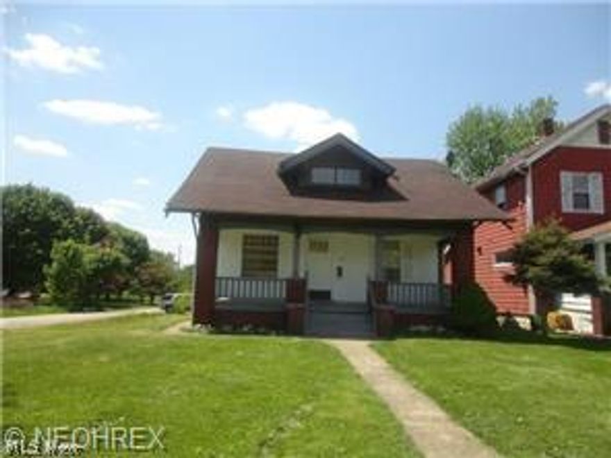 Already Cash Flowing! Located just 5 minutes from Youngstown State University This Spacious 4 bedroom, 2 full Bath home features 2 Living Room areas with Basement and detached 2 car garage. Repairs/Renovations the owner has done include tearing down to bare studs. Replaced all electric to code.  All new pluming, all new paint, all new carpet upstairs, new carpet in three bedrooms down stairs, installed closet in third bedroom downstairs, new kitchen including floor, new siding and paint outside, garage exterior painted, 2 garage door openers, landscaped, new exterior door. New furnace. Chimney repaired and roof repaired from wear and tear. This home comes with another piece of land across the street. Very beautiful home and like new. Rented at $550.00 a month plus utilities, in lease until 09/21/2015. This is a must see!!!