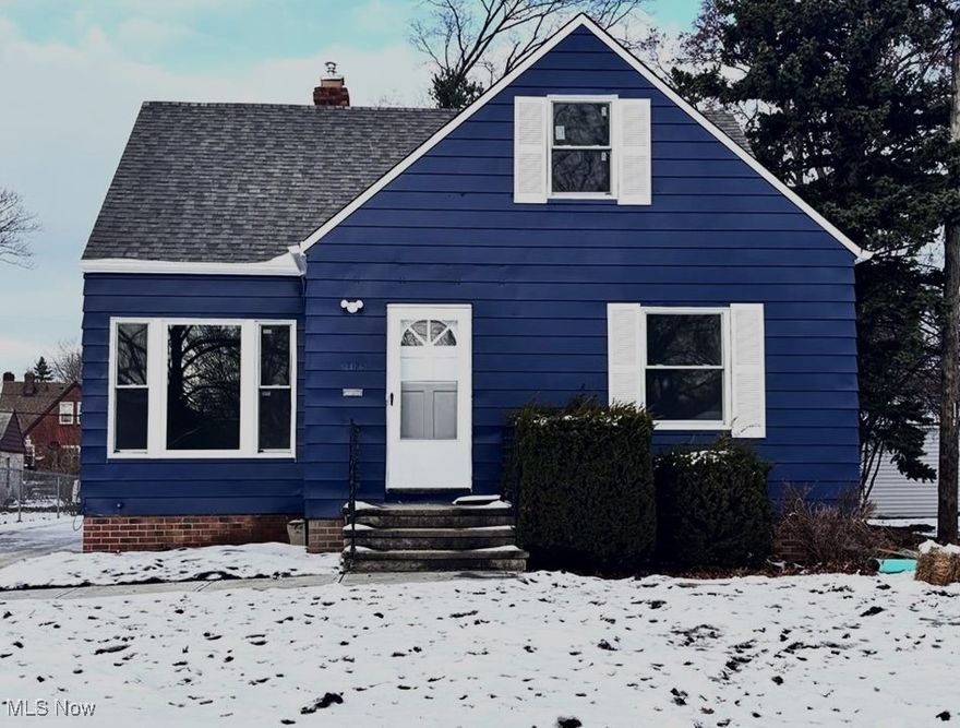 Explore this gem of a three-bedroom cape cod nestled in picturesque Euclid, Ohio. Known as the charming lakefront city, this home is a stone's throw away from the serene Lake Erie, inviting beaches, and the sprawling Cleveland Metroparks. Beyond the welcoming facade lies a tastefully updated interior, boasting an open kitchen adorned with Shaker Style cabinets, a striking custom-designed backsplash, stainless steel appliances, and sleek waterfall flooring. Entering the dining room, become captivated by the sliding patio doors leading to a freshly constructed deck, creating the perfect space for summer hangouts. The living and dining areas showcase the original hardwood floors that flow seamlessly into the spacious main-floor bedrooms. Each one fitted with energy-efficient vinyl windows. Ascend to the  third bedroom to discover a generously sized space complemented by plush carpeting awaiting your personal touch. Additional upgrades include a all new concrete driveway, a second full bath in the now partially finished basement, a new hot water tank, and some updated electrical & plumbing. Ensuring peace of mind, this home comes violation-free and with a 1-year home warranty. Don't get caught out in the cold - stop what you're doing and schedule your showing today!