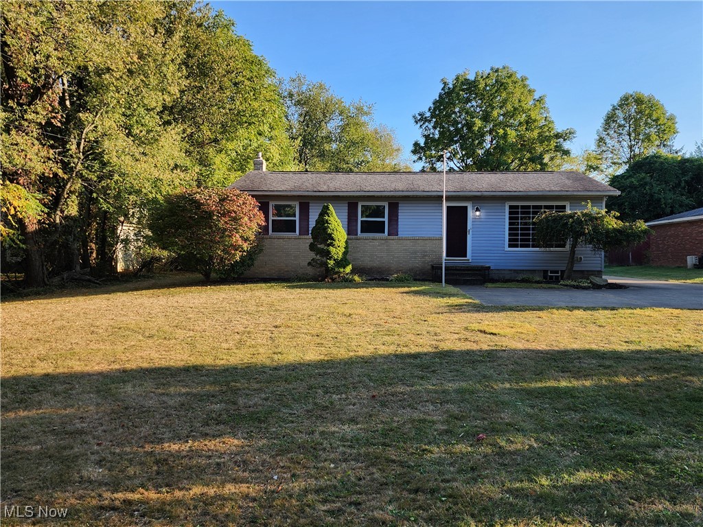Welcome to this 3-bedroom, 2-bath ranch home perfectly situated on a spacious 1+ acre lot. Step inside to a bright and inviting living room with gleaming hardwood floors that flows into an eat-in kitchen offering plenty of cabinets, counter space, and all appliances staying. A cozy step-down bonus room makes the perfect home office, family room, or flex space to fit your lifestyle. 3 bedrooms and main bath finish off the first floor. The full finished basement expands your living area with a large rec room and an additional full bath. Outside, enjoy the privacy of your oversized lot along with a 2-car detached garage. Composite deck with awning. Major updates give peace of mind, including a newer furnace, central air, and hot water tank. Don’t miss this rare opportunity for one-floor living on a large lot in Tallmadge!