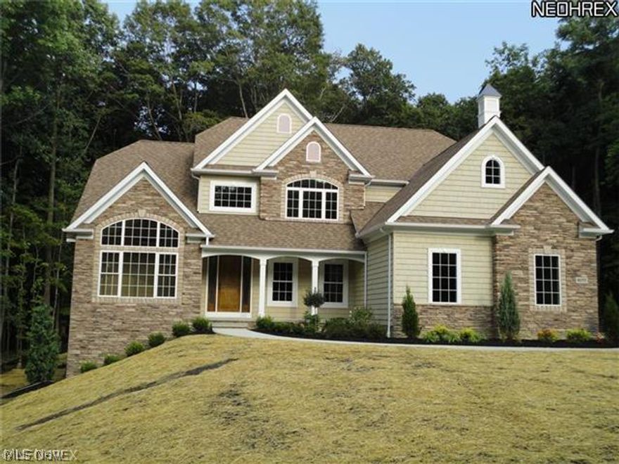 This home is National Green Building Certified & ENERYSTAR rated. Boasts 4402 sq. ft. with 4 BR, 5 BA, a 2-story foyer & large vaulted Family Room w/wall of windows & floor to ceiling stone fireplace with mantel.  The 1st fl master is luxuriously appointed w/ glamour bath. The 1st floor den/study provides convenience for paying bills or home office . The designer kitchen features raised serving bar, island, lrg pantry & expansive breakfast room w/tons of windows. Upstairs 3 lrg BRs, generous closets, 2 full baths, a loft and 11x10 bonus room off guest room. The basement features 1195 sq. ft. of finished space including fin. rec room w/wet bar, full bath & play/workout room. Green features: a dual fuel furnace that lowers heat/cooling costs plus on demand tankless water heater, low flow toilets, insulation upgrades, low VOC paints and sealants and CFL and LED lights save on energy costs. There are 46K in upgrades in this barely lived in home.  Come see for yourself!