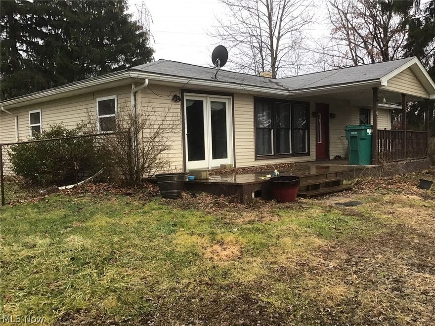 FIVE (5) miles from Calcutta is this one story 3/4 Bedroom ranch home. There are 6 rooms,A full water-proof basement. a chain link Fenced in back yard.
Lots of Hardwood floors.The  Home was Remodeled in 2003. Double hung Thermal windows. Located in Madison township and the school district is Beaver
 Local.  County Water and a new septic system will be completed when home is sold.The double driveway is graveled.