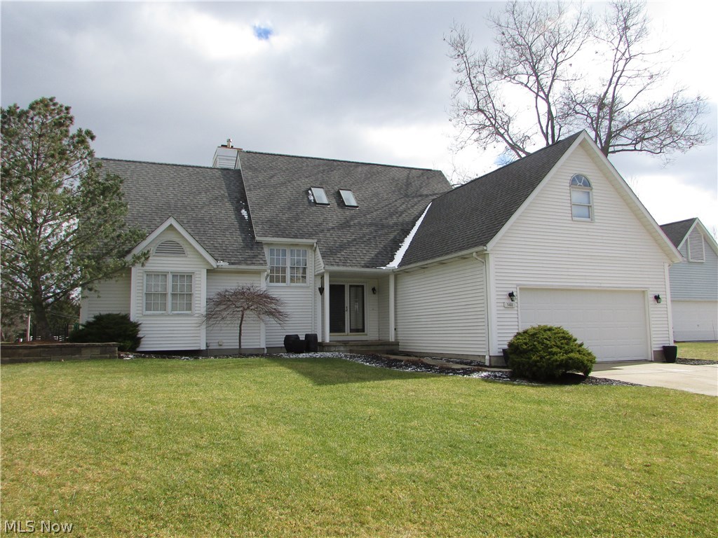 Wow! Over 4200 square feet of total living space in this amazing 4 bedroom 3.5 bath home on a cul de sac. With perfect views of a lake from the vinyl deck or stamped patio, the yard is also completely fenced, as well as a boat loading area. A huge living room has a fireplace and opens to the deck. A first floor master suite has an updated bath, huge walk in closet, and also opens to the deck. The eat in kitchen has an island, skylights over the eating area, and a formal dining room. The 2 story foyer also has skylights. Each of the bedrooms is large, with double sinks in the upstairs bath, and a huge bonus room. The fully finished basement adds over 1300 square feet of living space, with a family room with fireplace, rec area, gym/work out room, and a sauna! There is a first floor laundry, central vacuum, 2 car attached garage with additional parking, and so much more.