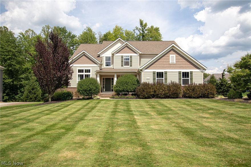 Gracious, neutral, and meticulously maintained, this Canyon Woods home will impress! Great curb appeal with freshly painted shutters and door. Covered front porch leads into the dramatic two-story foyer with sitting area. Beautiful dining room featuring trayed ceiling and setback for a hutch. Butler’s pantry connects to the stunning eat-in chef’s kitchen which serves as the heart of the home. Big island, maple cabinets, tiled backsplash, double oven, walk-in pantry, and many pull-outs. Sun-filled morning room with custom blinds. Huge living room overlooking the paver patio. The first floor also includes a fabulous family entry with laundry room, and a large office just off the half bath, which could be converted into a bedroom suite. Hardwood floors throughout most of the first floor. Upstairs you’ll find a spacious owner’s suite with trayed ceiling, wall of windows, huge closet with custom shoe racks, bathroom with soaking tub, two vanities, and tiled shower. Additional bedroom wing f
