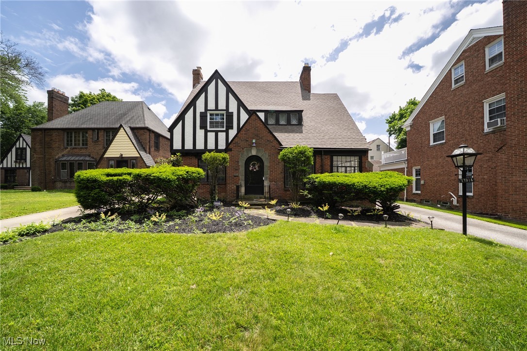 This stunning Tudor-style brick Colonial seamlessly blends timeless architecture with modern comfort. Offering 4 spacious bedrooms and 3 full baths, this turnkey home is designed for both everyday living and elegant entertaining. Step into a generously sized kitchen that provides ample space for cooking and gatherings, while the sizable bedrooms offer comfort and privacy for the whole family. Enjoy year-round comfort with central air, and take advantage of the 2-car garage for added convenience. Laundry in basement. The fenced-in backyard is perfect for outdoor relaxation or pets, complemented by a beautifully landscaped lawn that enhances the home's curb appeal. Located near top-rated schools, shopping, and a variety of restaurants, this home offers the perfect balance of charm, space, and accessibility. Don’t miss your chance to own a true gem in a highly desirable location!