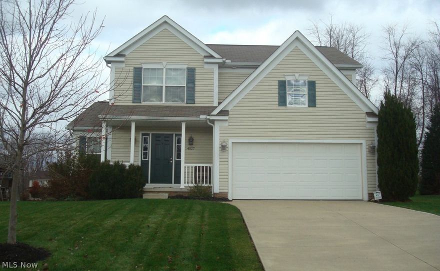 Lovely home, move in condition with very tasteful & neutral décor.  Large, fully appliance kitchen with breakfast bar.  Open to the great room featuring a stone fireplace & oak mantle.  The slider in dinette leads to the Trex deck & beautifully landscaped & private back yard.  There is a formal dining room, currently used a den, perfect size & location for either.  Vaulted master suite with a spacious bathroom; features make up vanity area, garden tub & shower; walk in closet.  1st floor laundry.  2 car garage.  Covered porch.