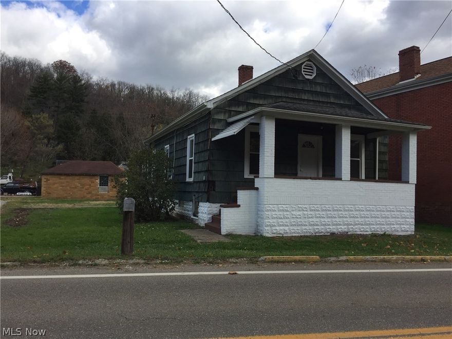 Move Into this nicely updated 2 bedroom, 1 bath home. Freshly painted, new carpet, ceramic bathroom, new furnace and updated kitchen. Roof about 8 yrs old, furnace 2yrs. 200 amp service.